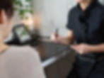 25482758_MotionElements_estheticians-in-black-uniforms-filling-out-medical.jpg