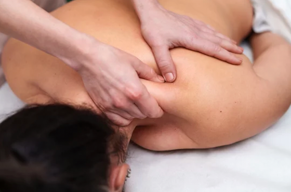 An AI image of a woman getting a back massage.