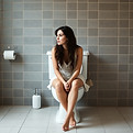 woman sitting on toilet_edited.jpg