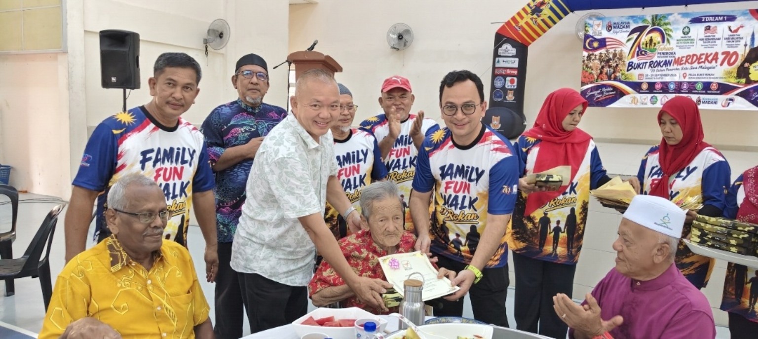 Potai Farmstay first-party Hari Malaysia 2026 event record at FELDA Bukit Rokan, Gemencheh, with Lai Fook Tai, YB Tuan Suhaimizan bin Bizar of N35 Gemencheh, and the FELDA Bukit Rokan manager