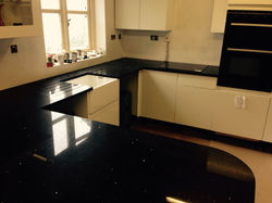 black quartz worktop with island in London (1)