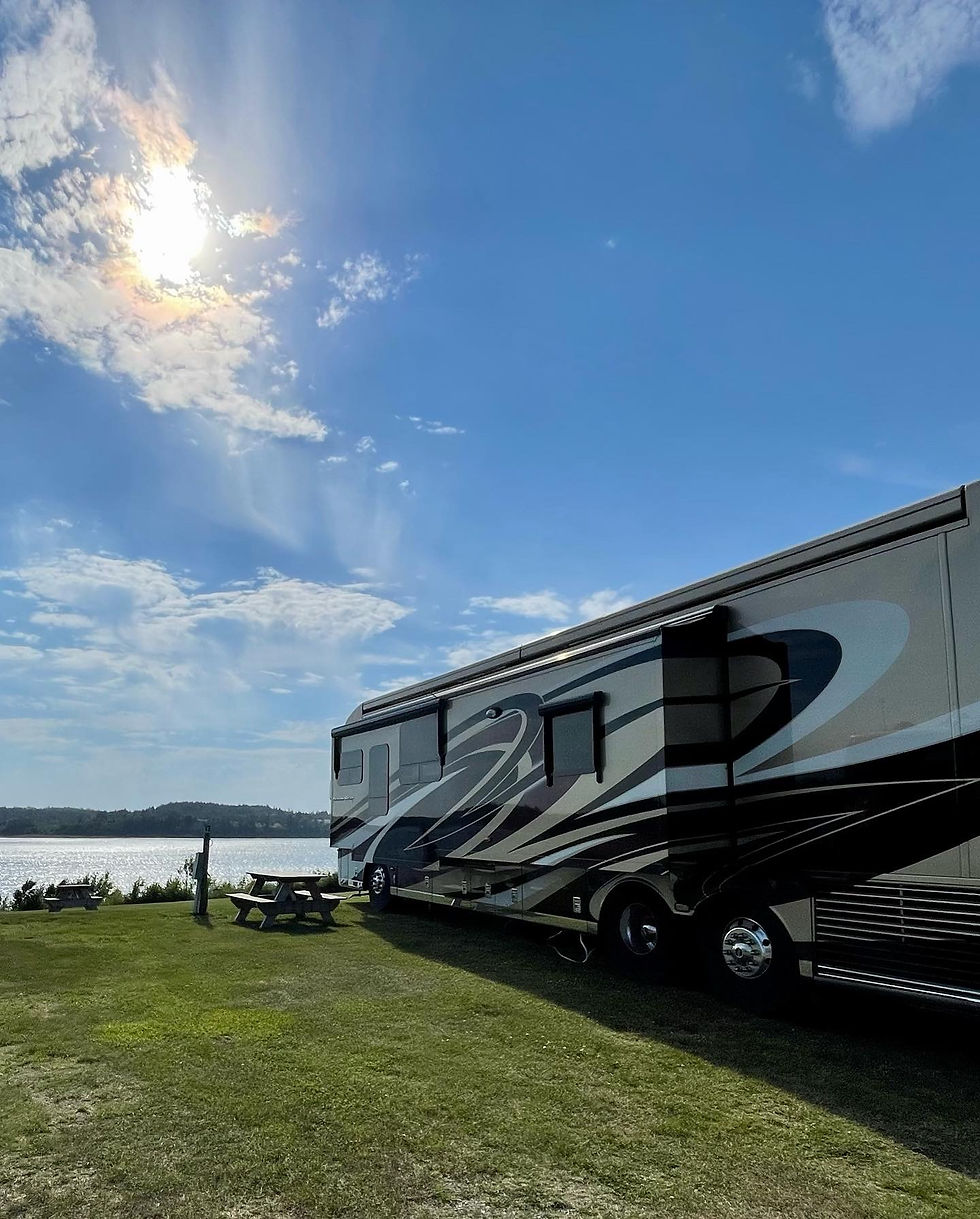 RV parked with view of bay