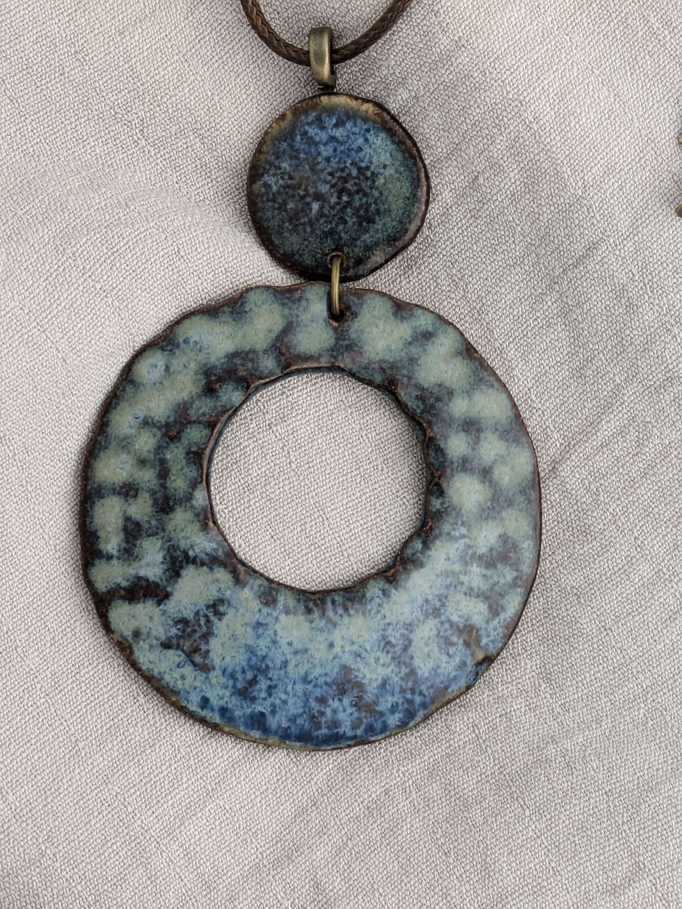 Thumbnail: Handmade Blue hammered ceramic statement circular necklace