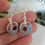 Thumbnail: handmade doughnut shaped ceramic and sterling silver earrings in pink and turquoise