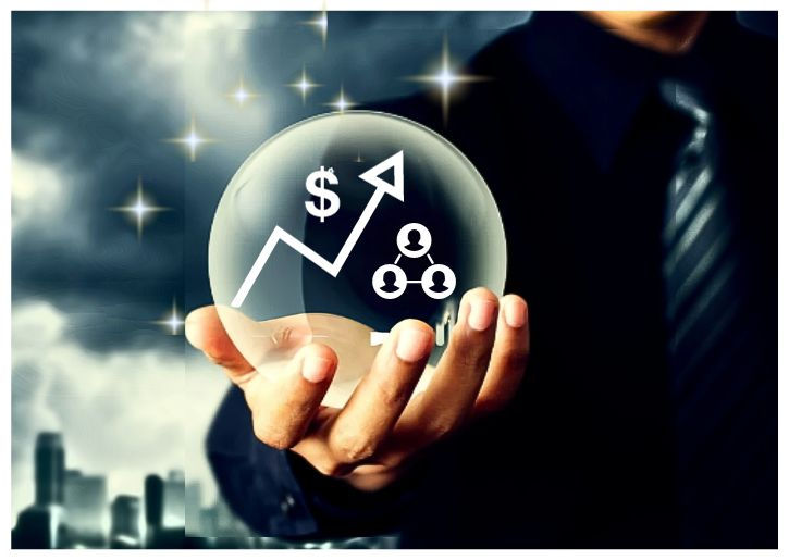 A business man holding a crystal ball