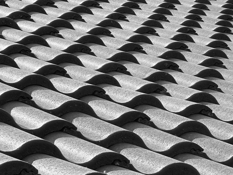 Restored terracotta tiled roof on a heritage home in Inner West Sydney.