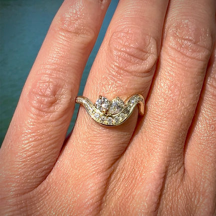 Diamond ring set in a flowing 14 carat yellow gold made in Brunswick Heads, NSW by a Byron Bay Jeweller