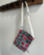 Two-in-one small tote bag styled as a crossbody for hands-free convenience