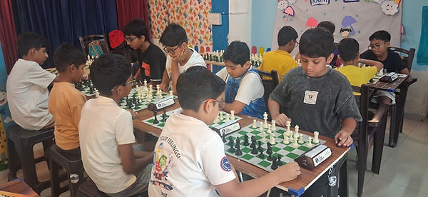 Young chess players participating in a chess camp and tournament organized by Giri Chess Academy