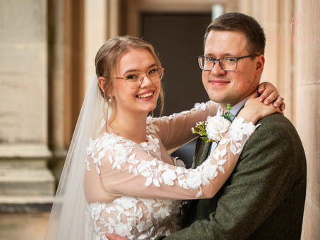 A relaxed and natural Keele Hall wedding photographed by Helen Cotton Photography, capturing Ashleigh and Daniel’s family wedding, confetti, grounds and rainy-day moments.