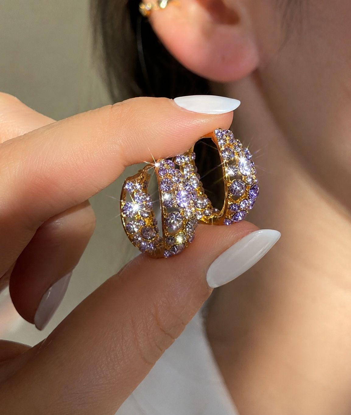 Boucles d’oreilles créoles ornées