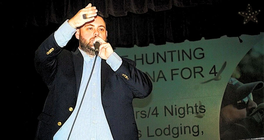 Professional auctioneer Jacob Strickland (TX LIC #18533) at benefit-charity auction in Dallas-Fort W