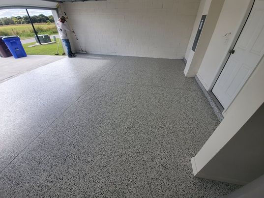 The 301 blend offers a minimalistic aesthetic with soft grays and whites, reminiscent of classic marble. This blend provides a sophisticated and timeless appearance, perfect for enhancing both modern and traditional spaces, especially epoxy garage floors.
