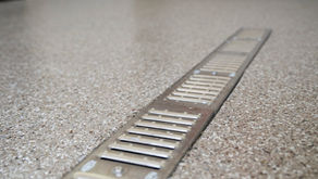 A Comprehensive Comparison: Epoxy vs. Traditional Garage Flooring!