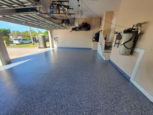 twilight epoxy floor garage with customer belongings on the roof
