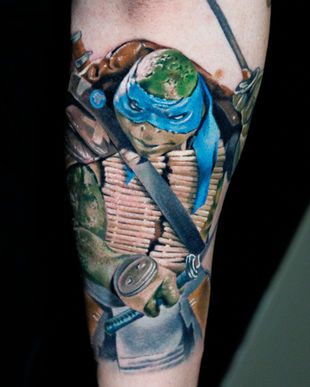 Colour Tattoo of turtle on an arm. Made in Llangefni, Isle of Anglesey, North Wales by Shelley Williams.