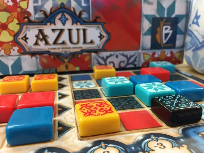 Why It’s Great: Azul tasks players with drafting colorful tiles to decorate a palace wall. Its tactile components and straightforward “draft-and-place” gameplay make it both visually stunning and approachable. 



Who’ll Love It: Anyone who enjoys puzzles or appreciates beautiful game design. 



Playtime: 30-45 minutes | Players: 2-4 | Complexity: Low-Medium