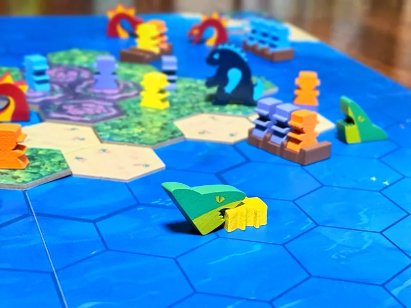 Why It’s Great: In Survive the Island, players navigate a sinking island, moving their explorers to safety while dodging sharks and sea monsters. Its chaotic, lighthearted gameplay guarantees laughs. 



Who’ll Love It: Groups who enjoy interactive, thematic fun. 



Playtime: 45-60 minutes | Players: 2-4 | Complexity: Low