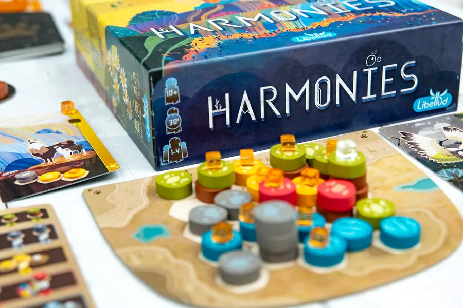 Why It’s Great: In Harmonies, players create vibrant landscapes by placing tokens to form patterns of animals and terrain. Its gorgeous art and intuitive tile-placement mechanics captivate newcomers while offering light strategy. 



Who’ll Love It: Creative types who enjoy puzzles and aesthetics. 



Playtime: 30 minutes | Players: 1-4 | Complexity: Low