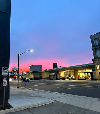 Sunrise over a via rail station and an intersection in southwestern Ontario