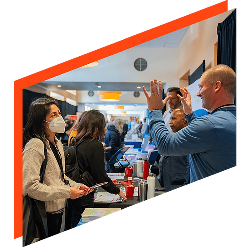 image of animated guests in crowded exhibit hall 