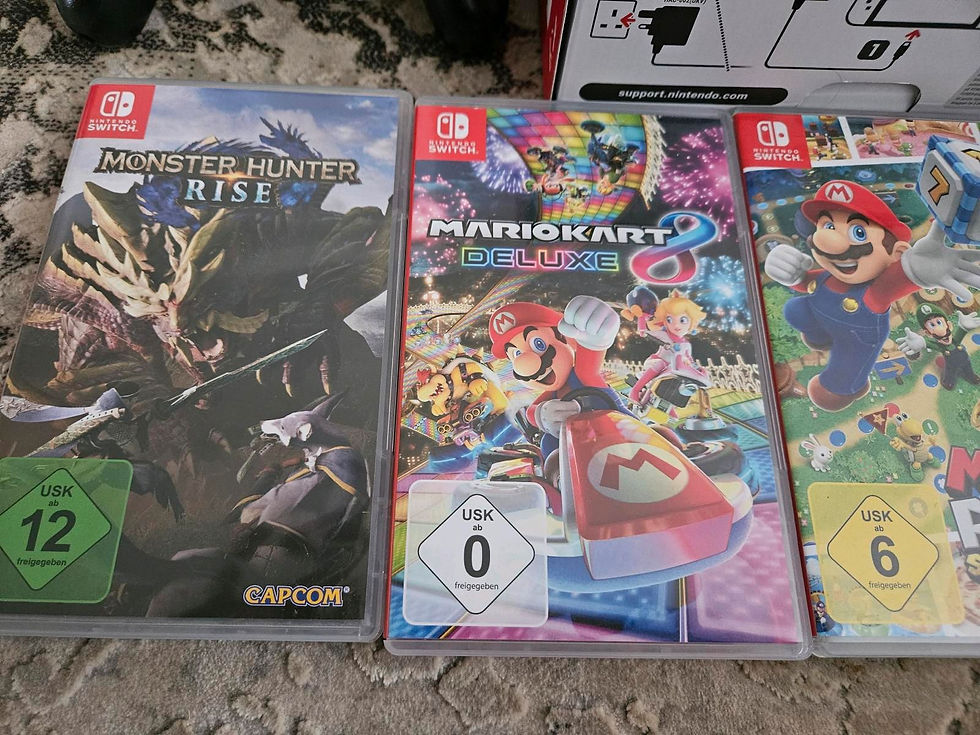 Miniaturbild: Nintendo Switch OLED + 5 Spiele + Pro Controller + Garantie