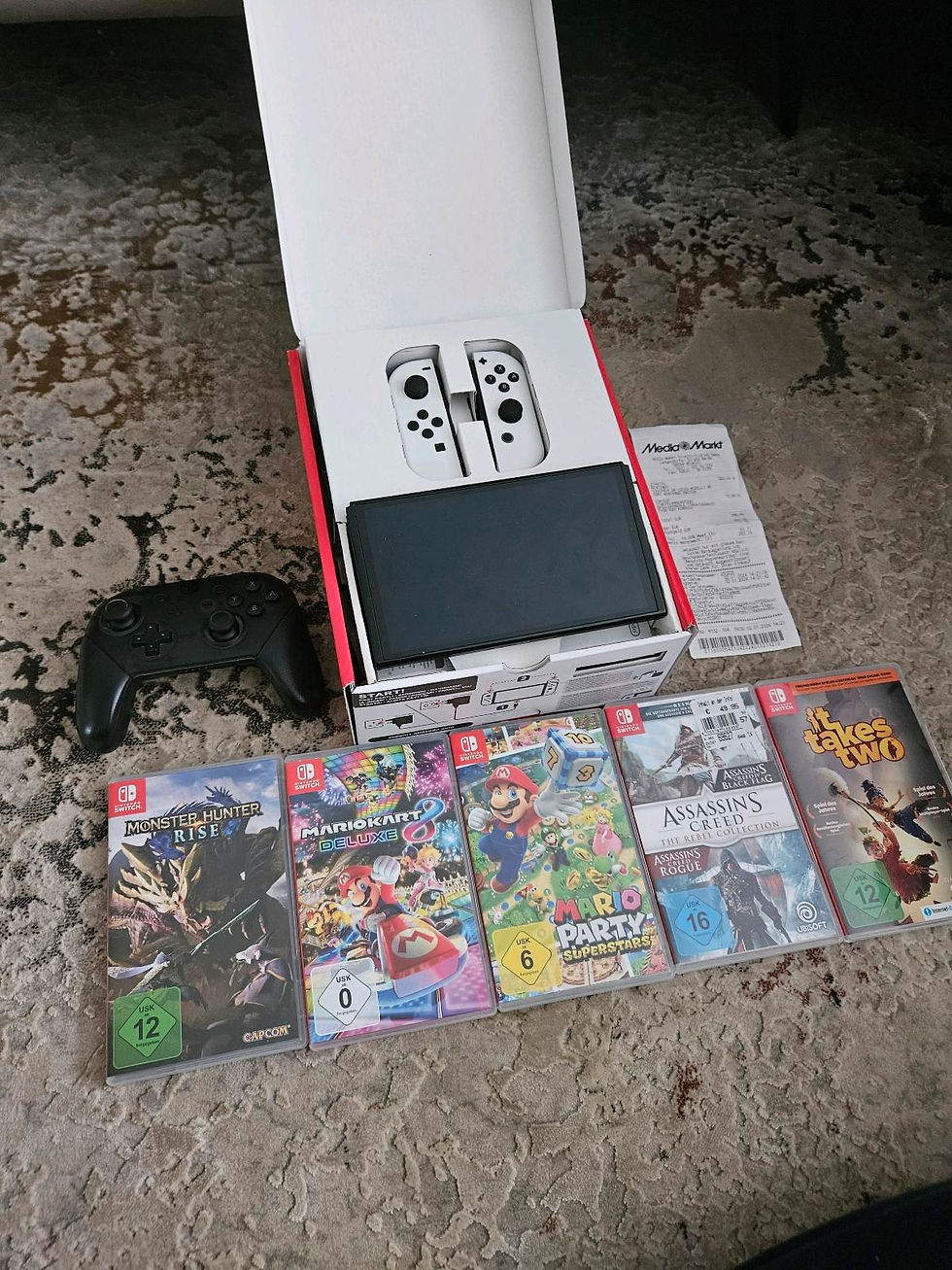 Miniaturbild: Nintendo Switch OLED + 5 Spiele + Pro Controller + Garantie