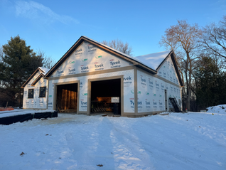 Tyvek house wrap installed on Michigan home before LP SmartSide siding install.