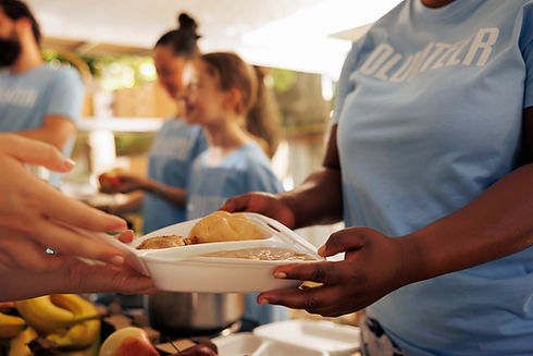 close-up-young-black-woman-hands-distributing-fresh-produce-needy-homeless-people-food-dri