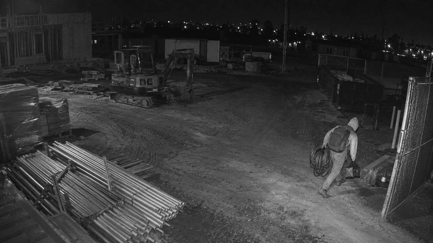 AI detection of a person carrying copper wire and tools off a construction site
