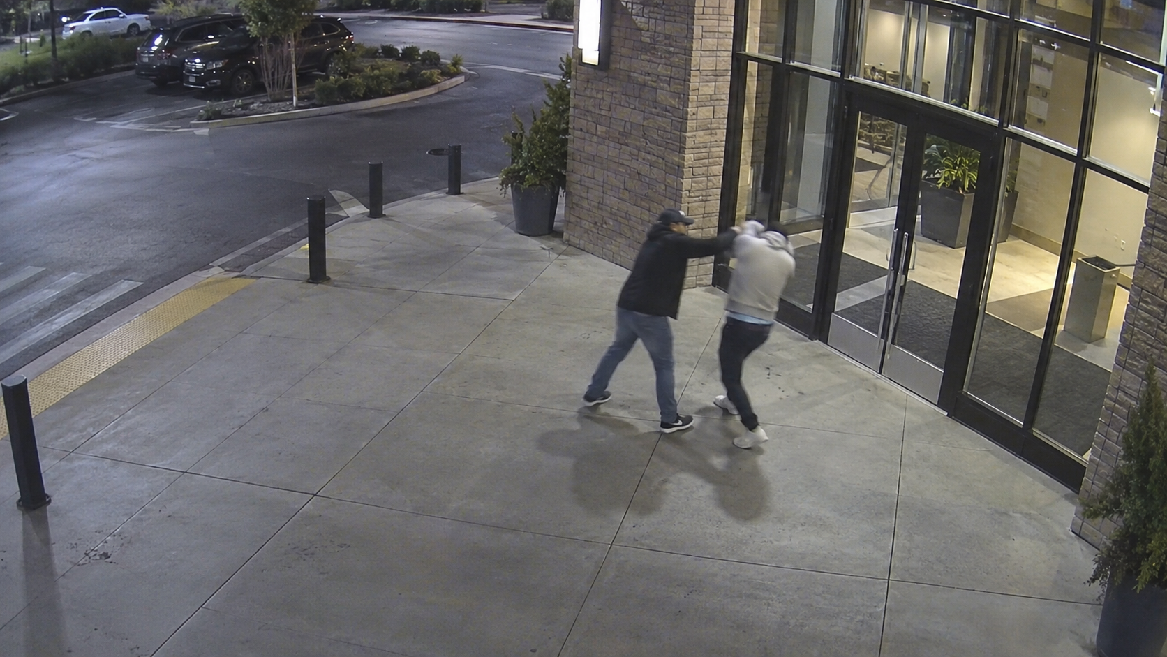 AI detection of a fight outside a building entrance