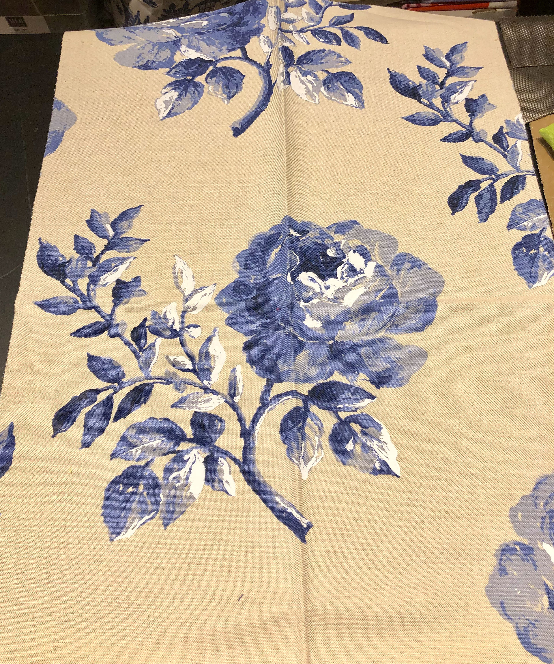Periwinkle roses on linen