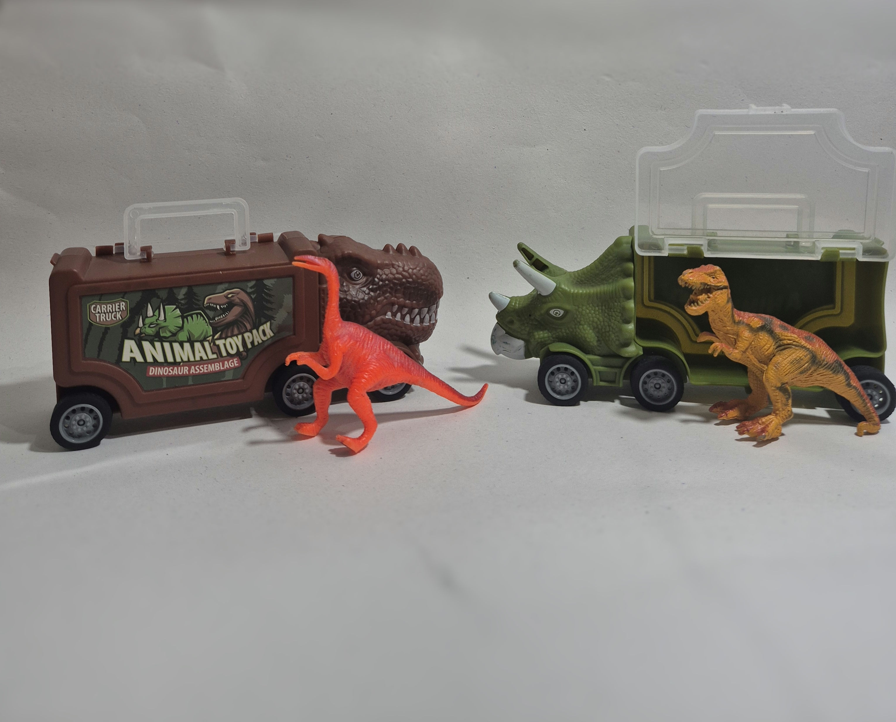 Kit 2 carros de transporte dinossauros