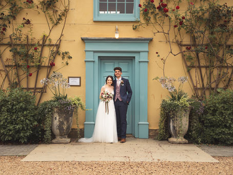 Bride & Groom in front of South Farm wedding venue