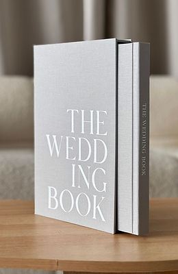 A wedding album that looks like a book with sleeve
