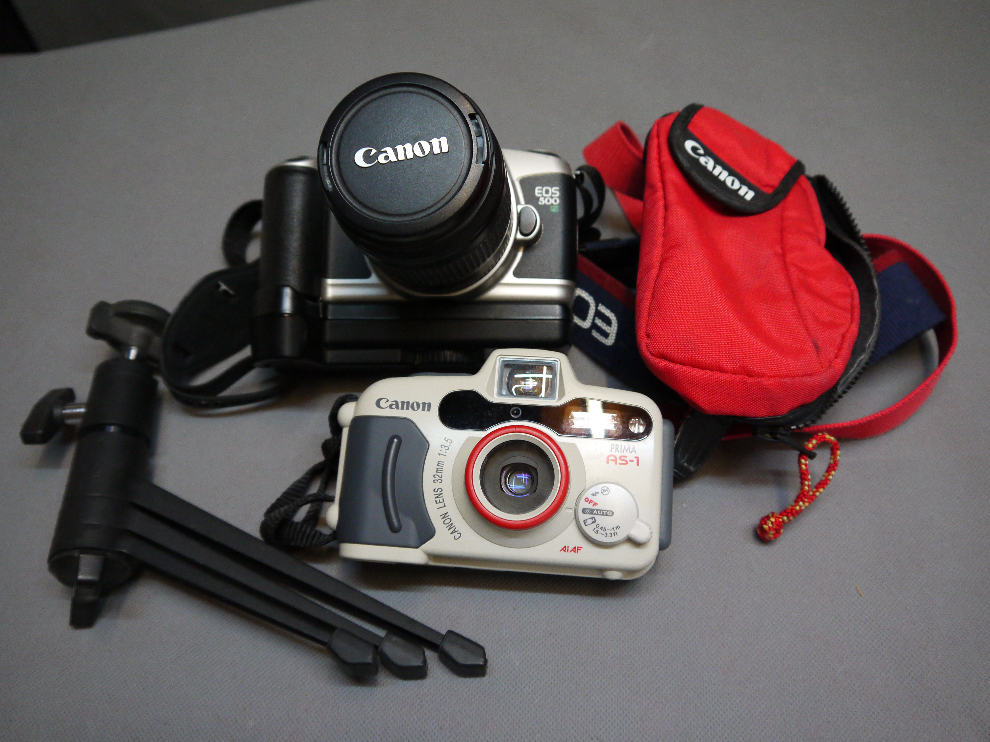 2 Fotokameras:Canon EOS 500N Spiegelreflex, Canon Prima As 1 Kompaktkamera Antiq