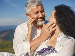 Couple looking and touching each other's face