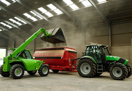 Loading Grain into Mixer