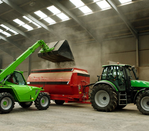 Loading Grain into Mixer