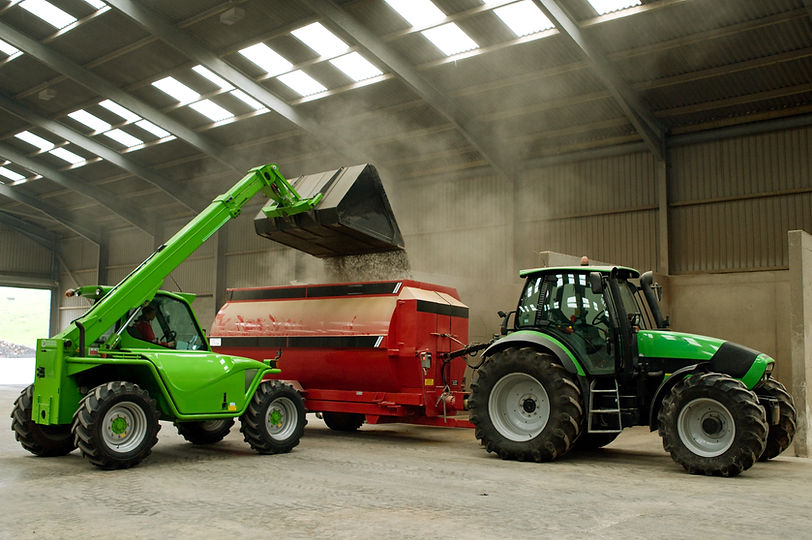 Loading Grain into Mixer