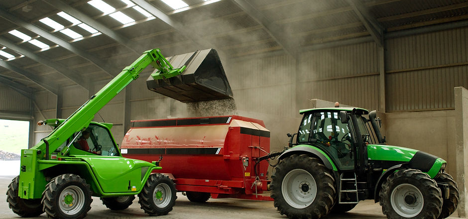 Loading Grain into Mixer
