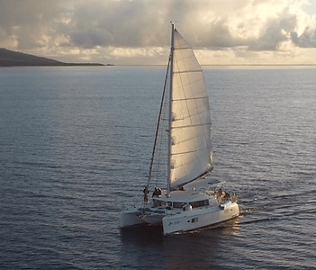 a boat in Oahu at sunset