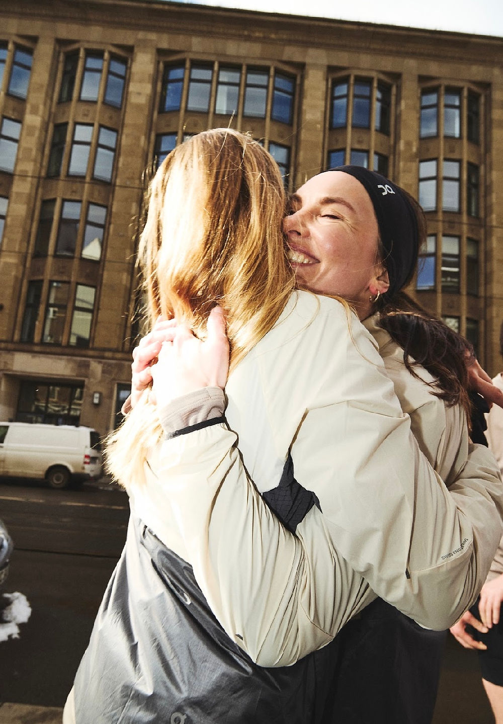 Happy women hugging in community