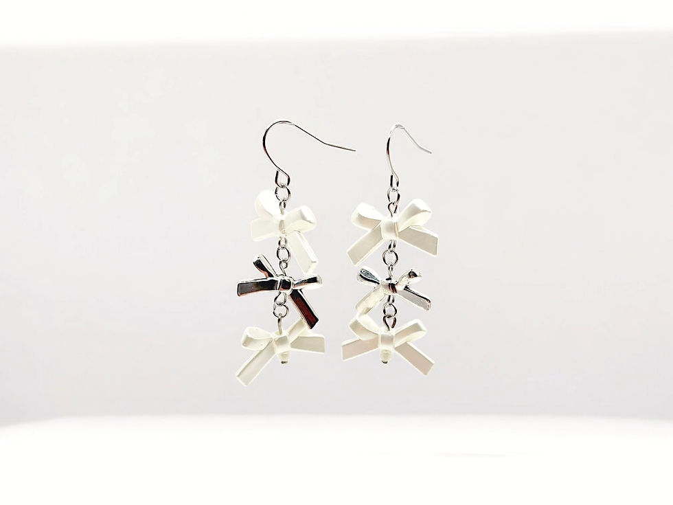 Thumbnail: Duality Bow Drop Earrings