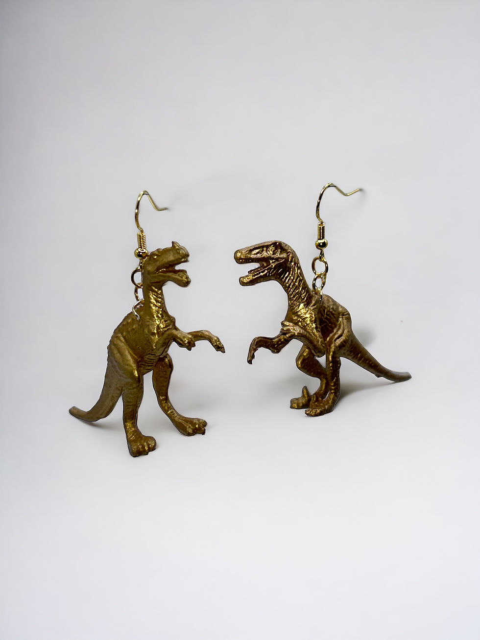 Miniatyrbild: Metallic Golden Dinosaur Earrings