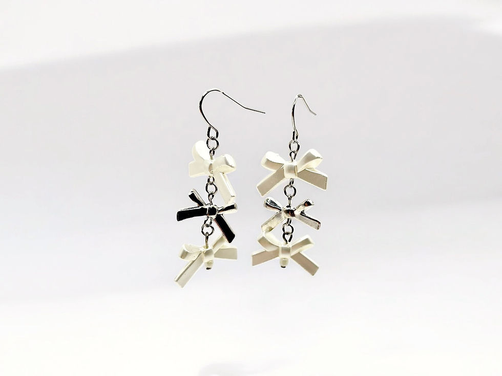 Thumbnail: Duality Bow Drop Earrings