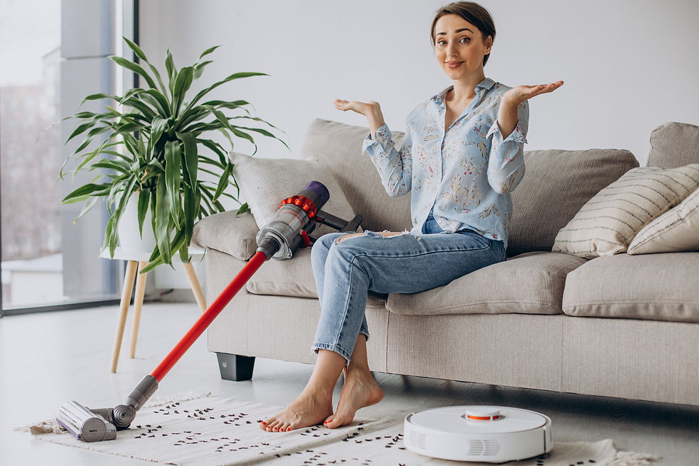 woman-sitting-sofa-choosing-vacuum-cleaner (1).jpg