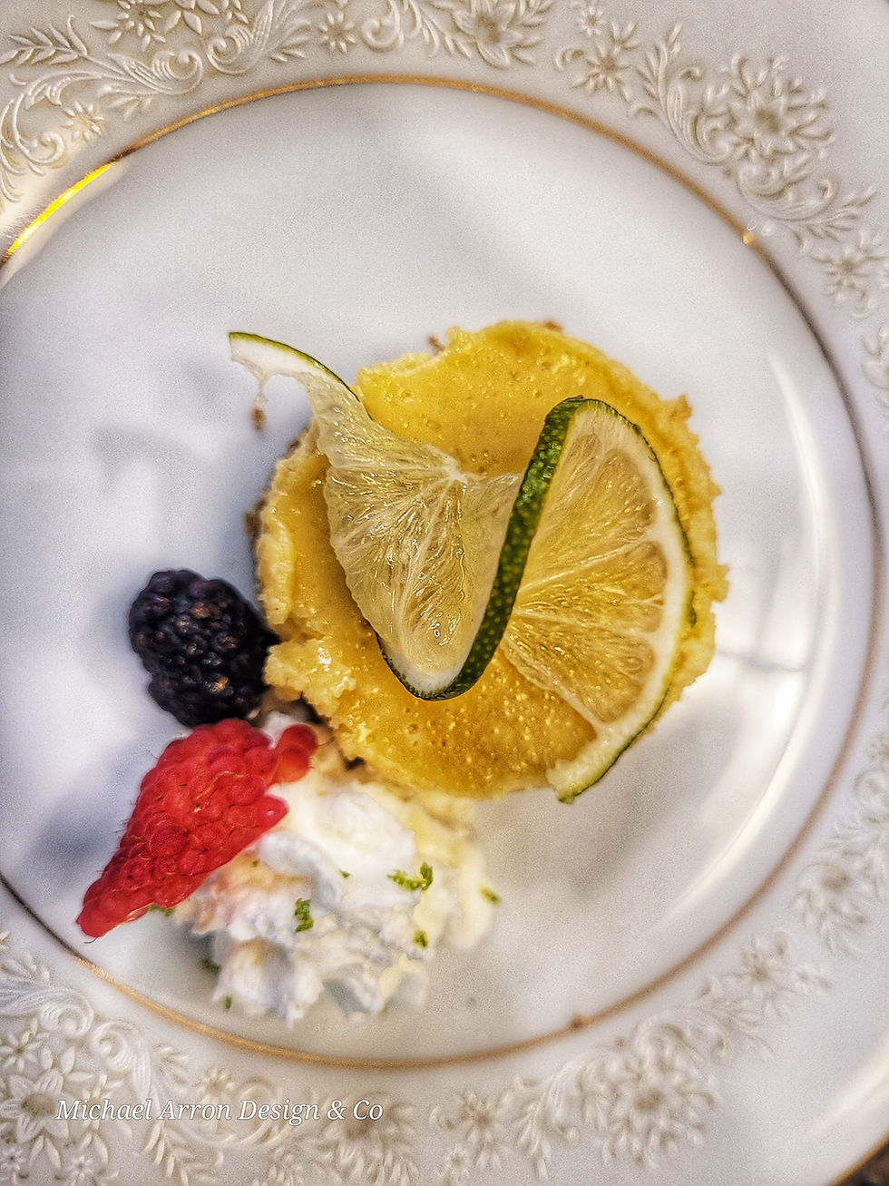 Plated dessert with citrus and berries