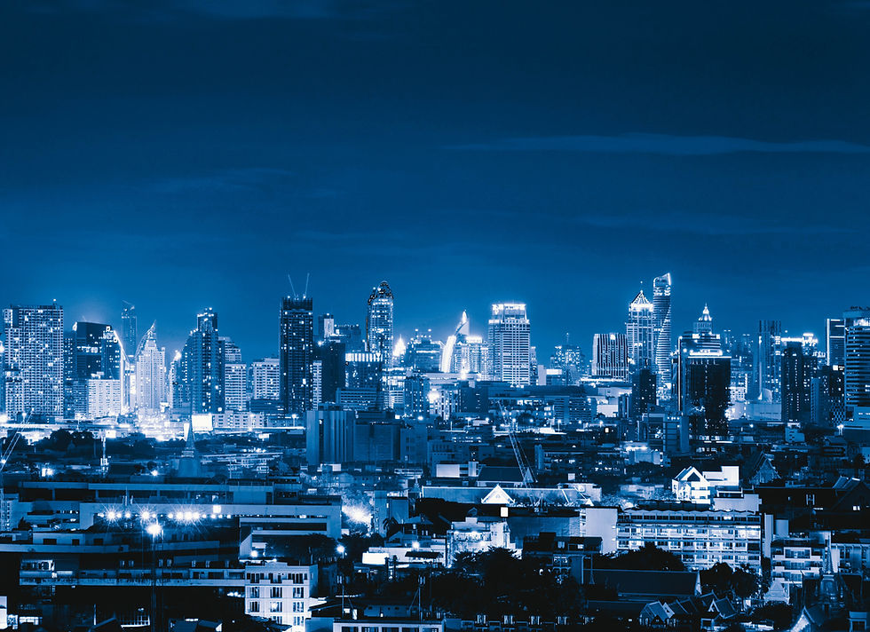 high-angle-view-illuminated-buildings-against-sky-night.jpg