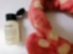 Philosophy Purity 3-in-1 Cleanser with a fluffy spa headband